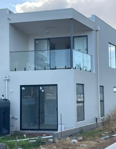 Frameless balcony glass railing installation Adelaide residential home