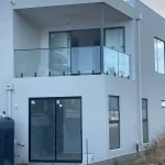 Frameless balcony glass railing installation Adelaide residential home