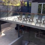 Glass balustrade around an outdoor entertaining deck